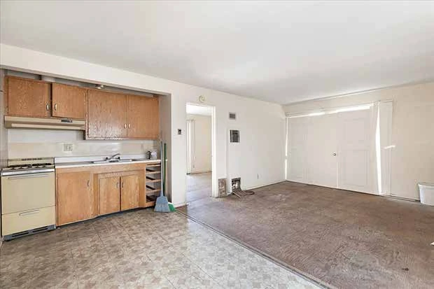 Kitchen and living area before renovation