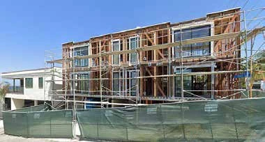 Apartment building framed and under construction